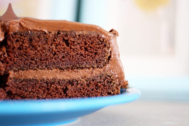 gluten free chocolate cake on a blue plate