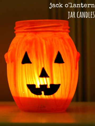 Super simple painted jack o'lantern jar candles. An easy fall craft. #halloween #jackolantern #craft #jar