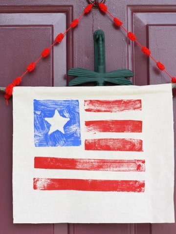 stamped flag hanging for front door