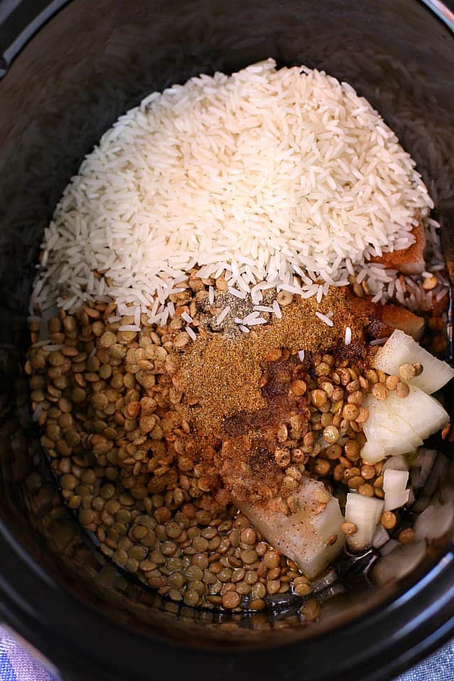 lentils rice and spices in a slow cooker