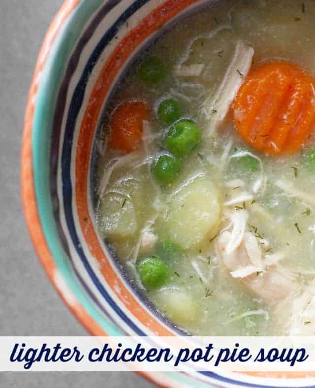 chicken soup in a striped bowl