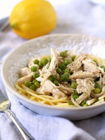 lemon chicken and pasta in a white bowl