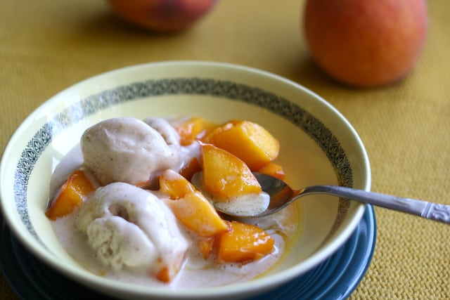 peaches and ice cream in a bowl