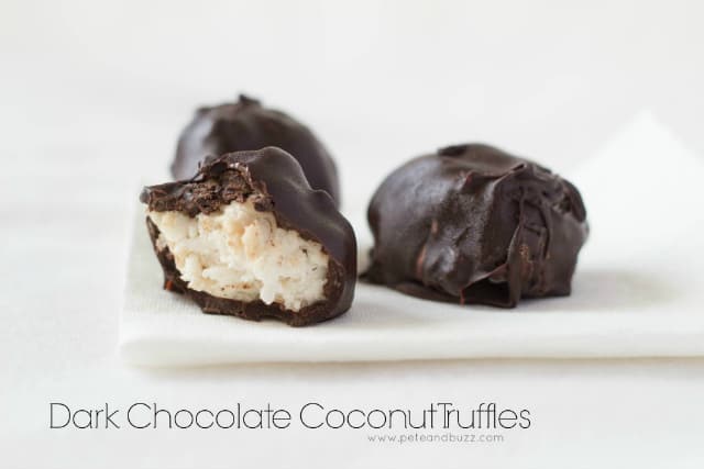 dark chocolate coconut truffles sitting on a white napkin