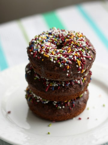 vegan chocolate donuts on a white plate