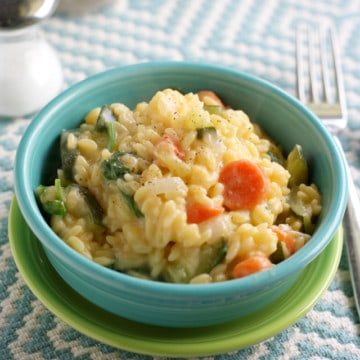 A comforting one pot meal - creamy orzo with vegetables.
