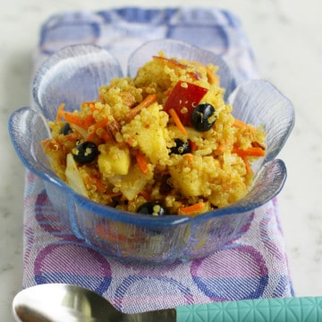 Curried quinoa salad with almonds and fruit. Vegan and gluten free.