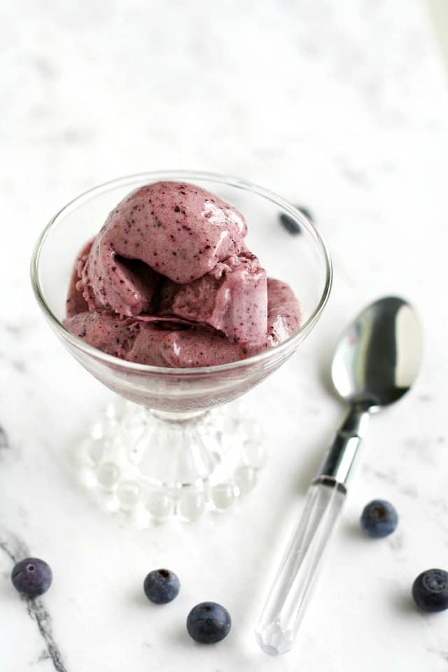 no-churn blueberry ice cream in a glass cup