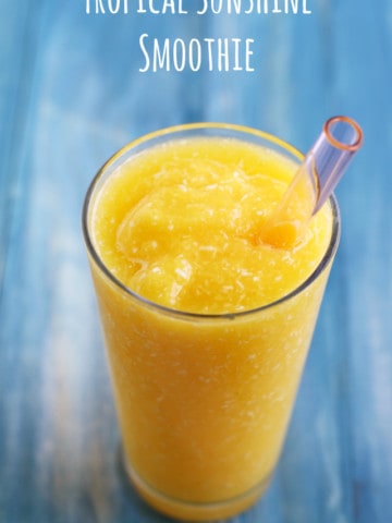 A fresh and delicious smoothie with mango, pineapple, and coconut.