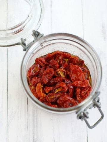 Preserve a little bit of summer by drying cherry tomatoes in the oven. Easy to do, and so delicious!