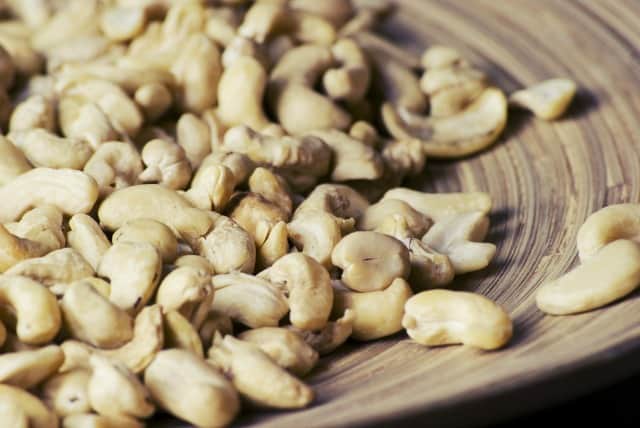 cashews in wood bowl
