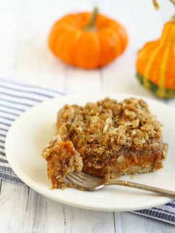 A fantastic Thanksgiving dessert - Pumpkin Pie Crumble Bars. A creamy filling with a crumbly, buttery topping.