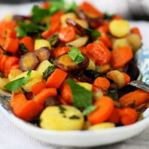 roasted rainbow carrots in a white dish