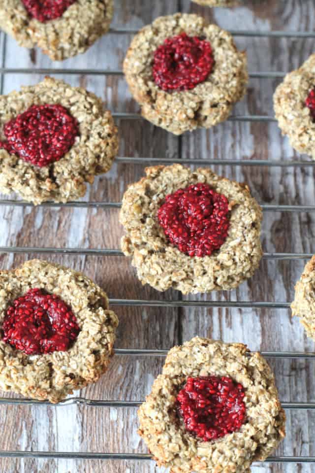 Oat thumbprint cookies on a cooling rack