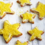 Festive and delicious vegan lemon frosted sugar cookie recipe.