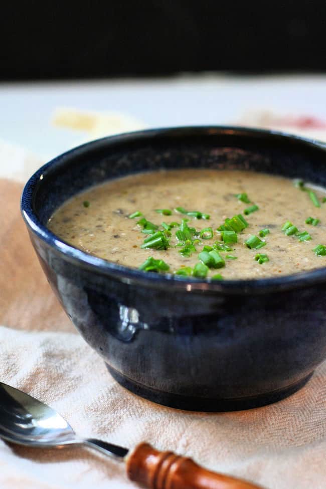 vegan cream of mushroom soup with chives on top