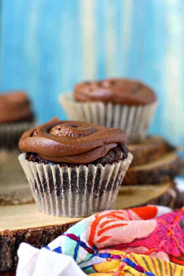 vegan gluten free chocolate cupcakes on a wooden tray