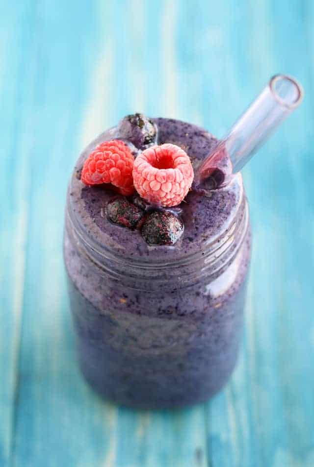blueberry raspberry smoothie in a mason jar