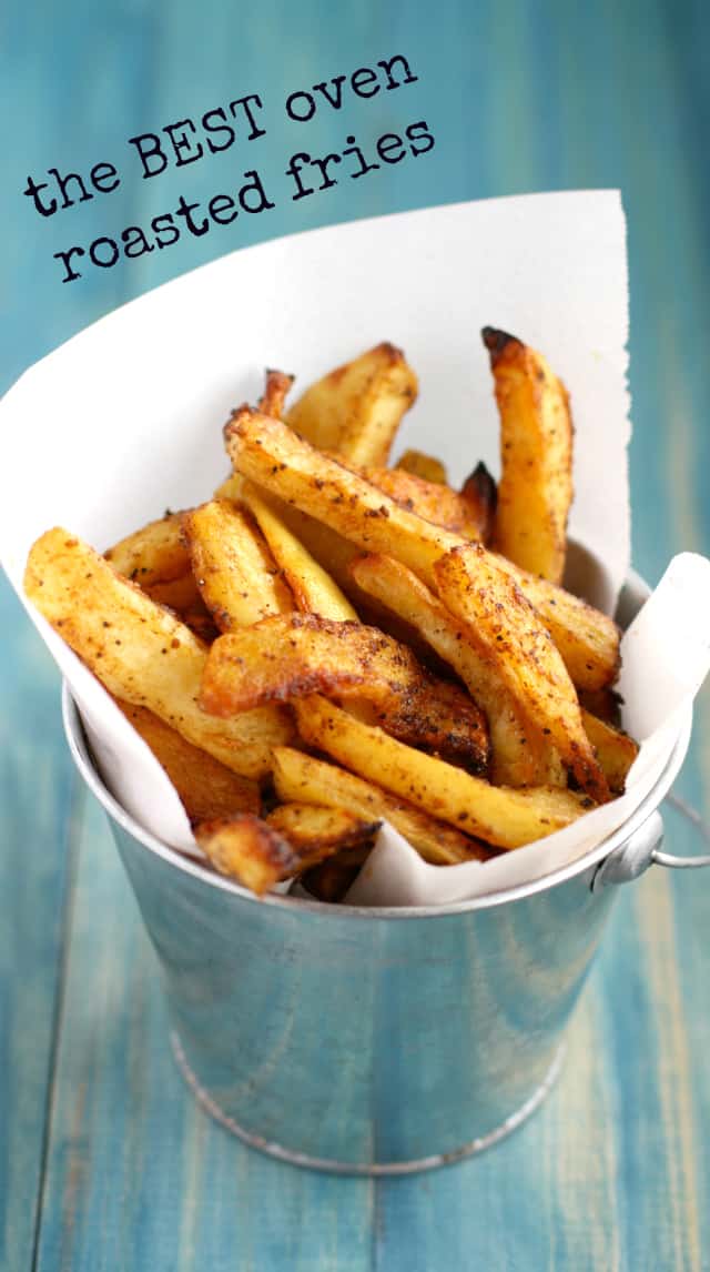 perfectly baked seasoned fries in a silver pail