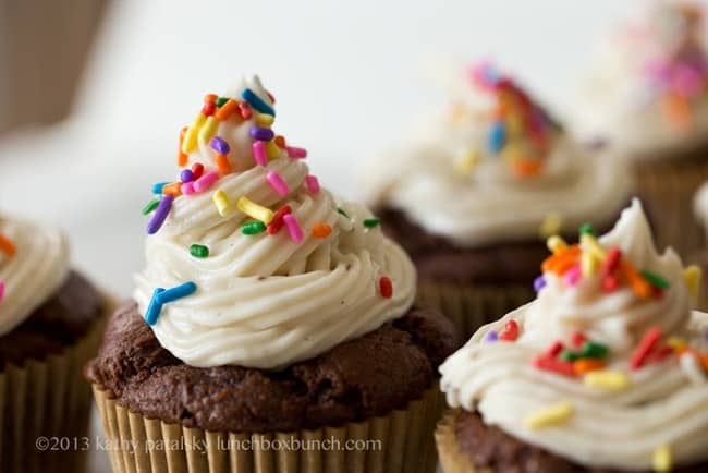 frosted chocolate cupcakes with sprinkles