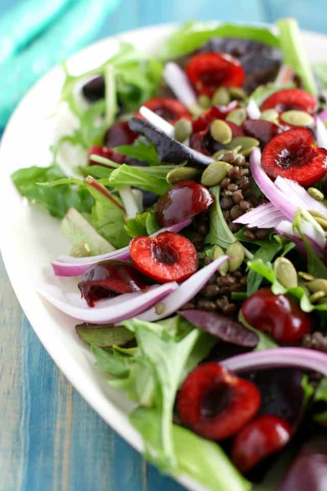green salad with lentils and sweet cherries