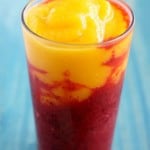 A colorful and healthy anti-inflammatory smoothie made with mangoes and cherries. #antioxidants #smoothie