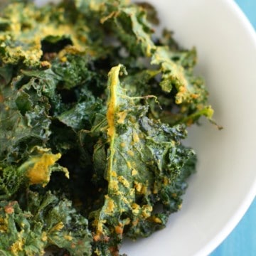 Vegan cheesy kale chip recipe. No nuts involved in this easy recipe!