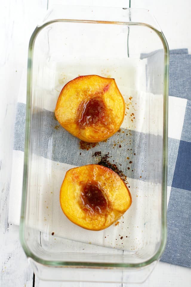 Simple dessert for summer! Roasted peaches with toasted coconut and ice cream. 