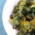 Light and crispy kale chips with a tasty vegan cheesy flavor! Yum! A perfect healthy snack.