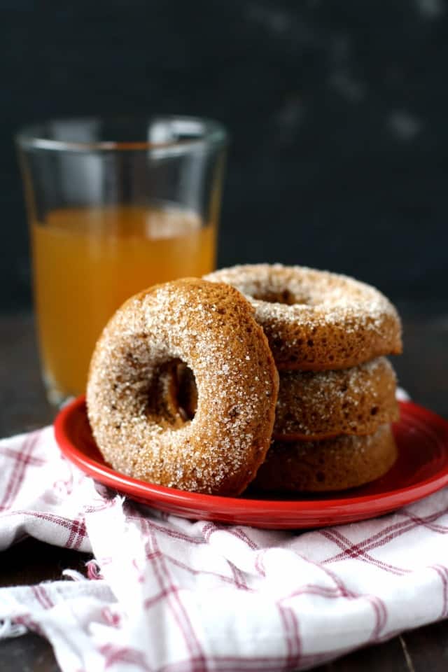 apple cider donuts on a red plate