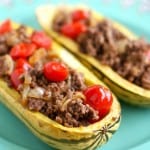 Delicata squash stuffed with ground turkey, tomatoes, and onions. An easy, healthy meal.