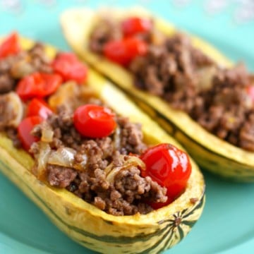 Delicata squash stuffed with ground turkey, tomatoes, and onions. An easy, healthy meal.