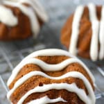 These pumpkin spice mini bundt cakes are so delicious - the sweet cream cheese glaze is the perfect finishing touch! #vegan #glutenfree AD