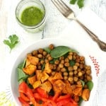 A healthy fall salad with roasted sweet potatoes, chickpeas, and cilantro vinaigrette. Vegan and gluten free.