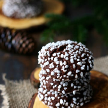 Chocolate polka dot cookies are made with a rich chocolate batter and rolled in Swedish pearl sugar. These look so pretty for a holiday party! Gluten free and vegan.