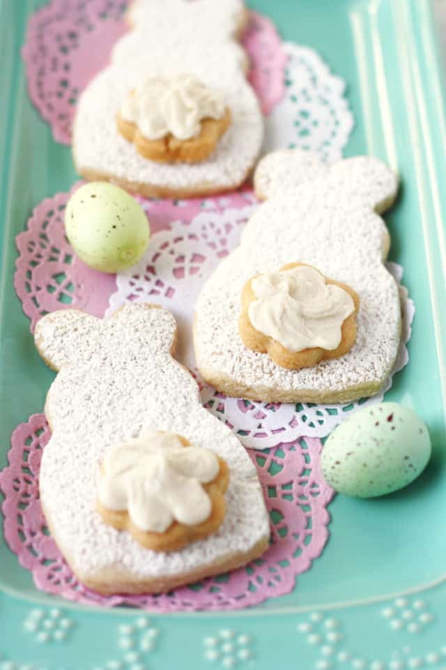 sugar cookies shaped like bunnies on an aqua tray