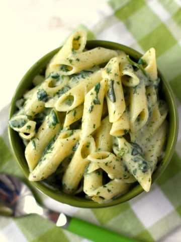 Pasta with a cheesy spinach sauce is a family favorite! Easy comfort food.