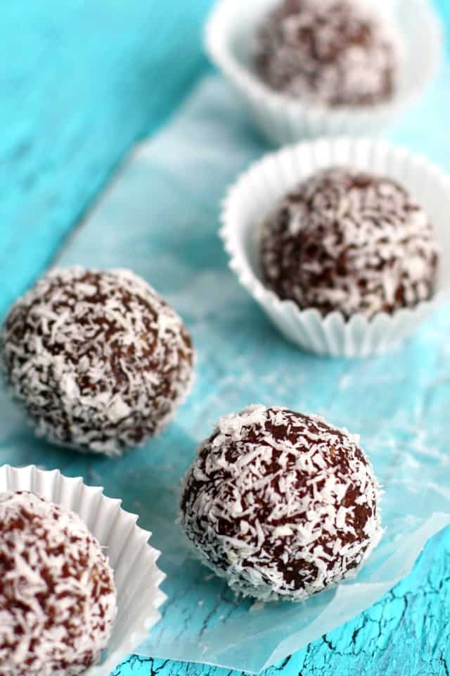 chocolate energy balls on a blue background