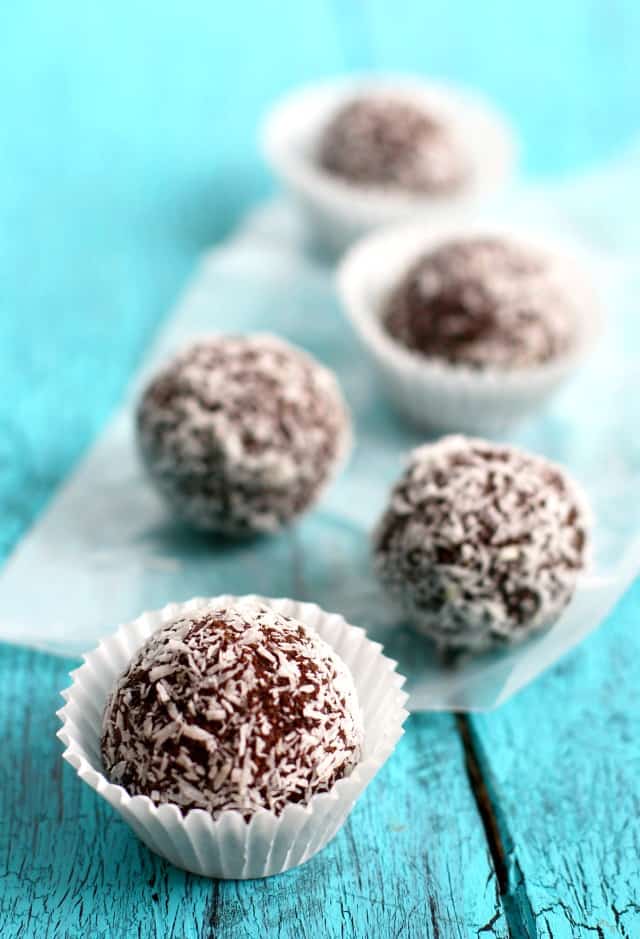 no bake chocolate coconut energy bites in paper wrappers