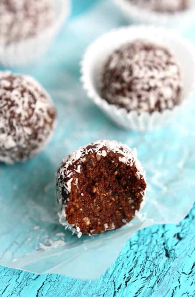 coconut energy balls on a blue background