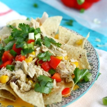 This slow cooker Mexican chicken is a delicious and easy dinner idea. It's just right over tortilla chips or rice and beans. #ad