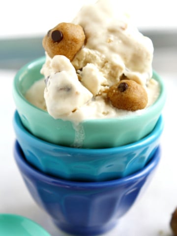 Ultra creamy dairy free coconut vanilla ice cream is studded with delicious bites of cookie dough! This is a vegan ice cream recipe you have to try!