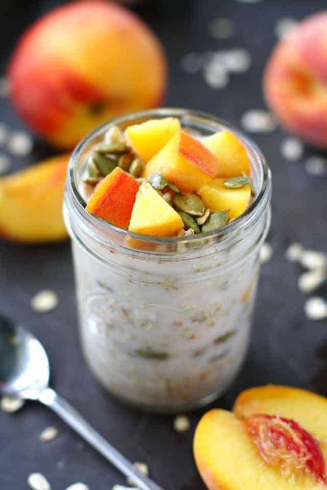 vegan overnight oats with peaches in a jar