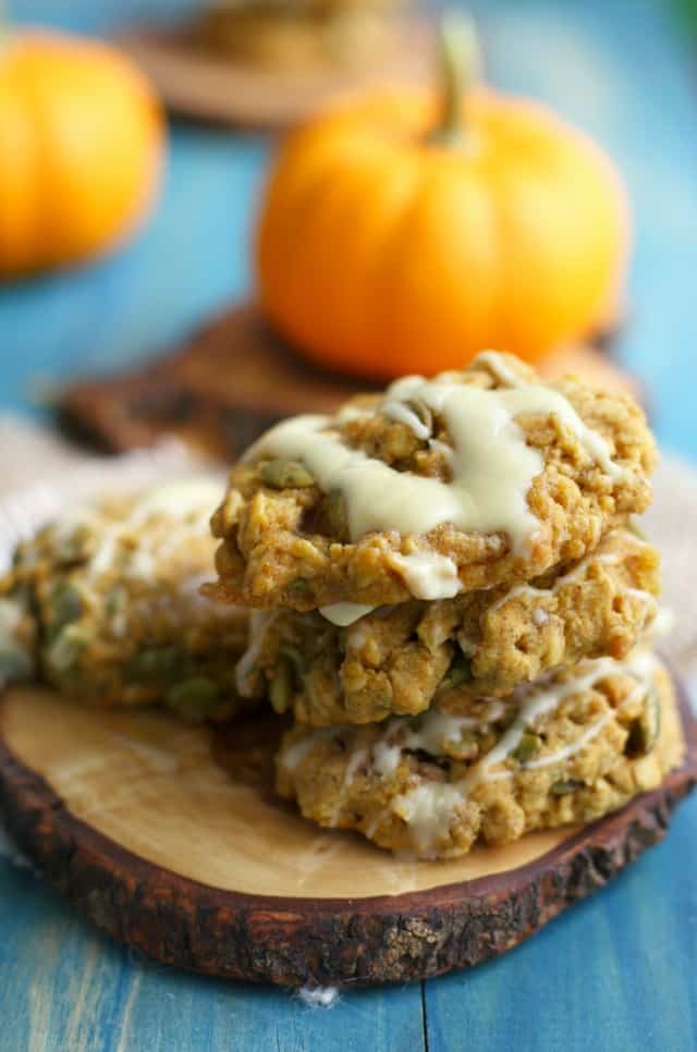 vegan oatmeal cookies with a mini pumpkin in the background