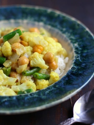 Cozy and comforting green bean and cauliflower curry is an easy meal option that's vegan and allergy friendly!