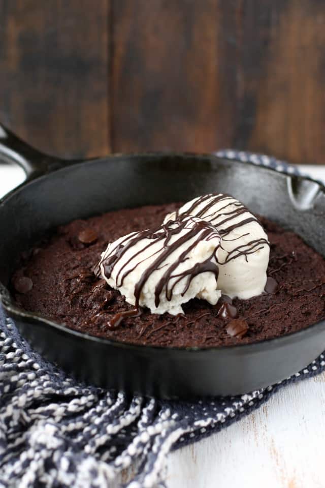 brownie in a pan with ice cream on it