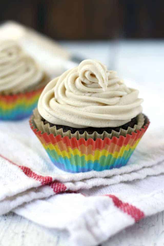 vanilla dairy free buttercream frosting piped on a cupcake