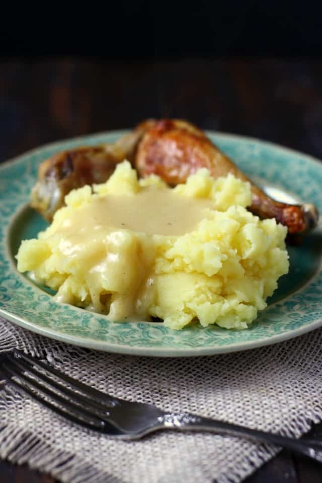 chicken legs with mashed potatoes and gravy