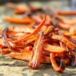 easy carrot fries on a cookie sheet
