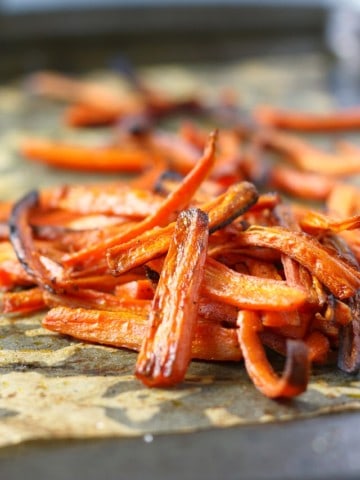 easy carrot fries on a cookie sheet